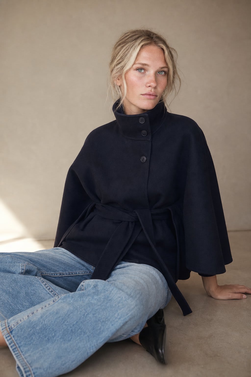 Emma | cape coat with stand collar and belted waist