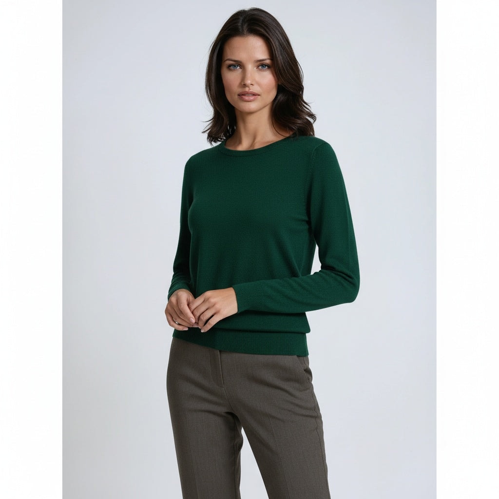 Front three-quarter view of a dark green crew neck sweater with long sleeves and a ribbed lower edge.