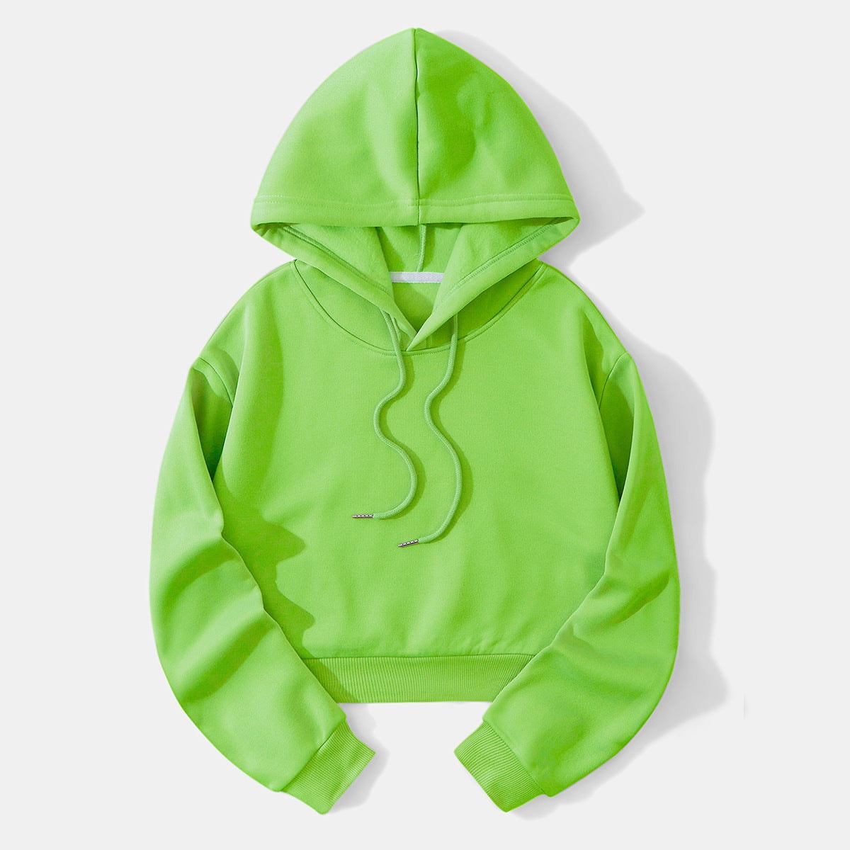 Neon green cropped hoodie displayed flat with a raised hood, long sleeves, ribbed cuffs and hem, and matching drawstrings.