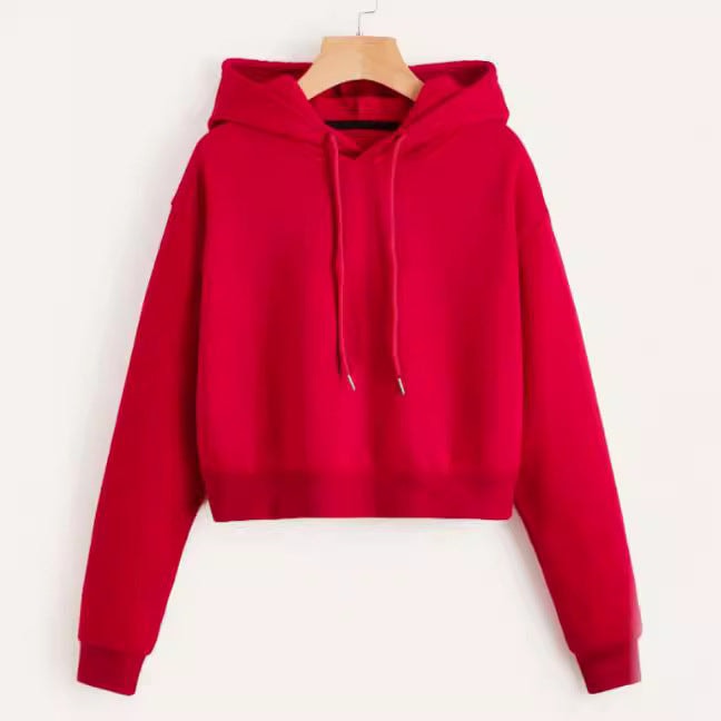 Bright red cropped hoodie on a hanger with a front pullover design, adjustable hood drawstrings, long sleeves, and ribbed cuffs.