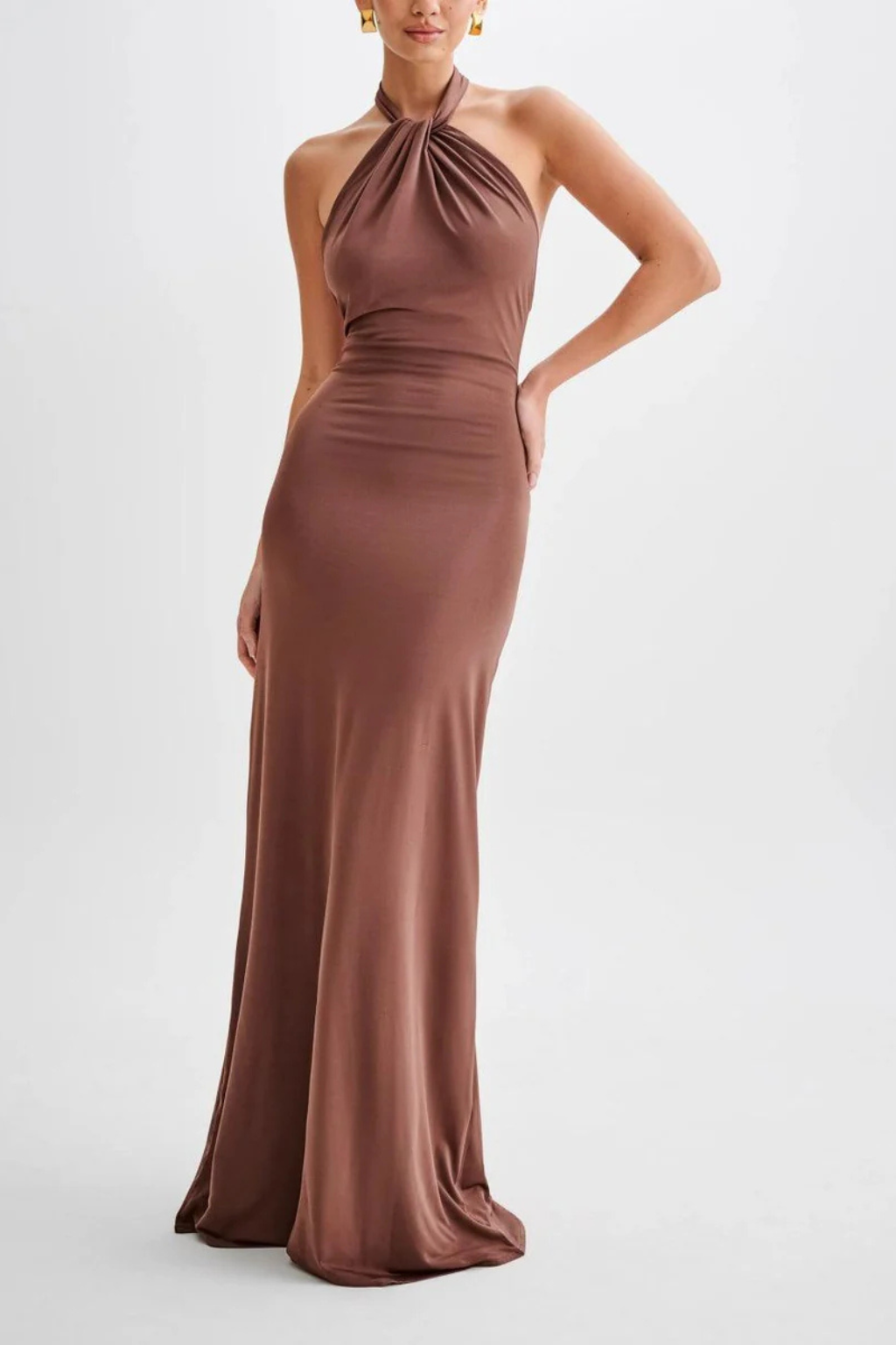 Model wearing a halter neck maxi dress with gathered bodice and open back in a bodycon silhouette._8