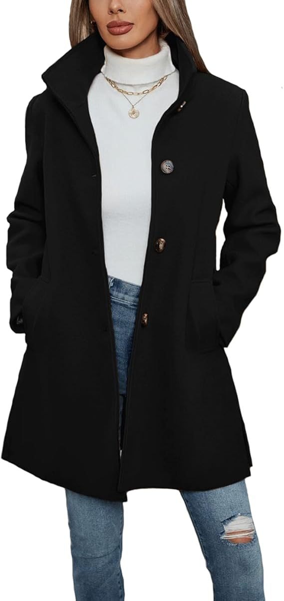 Close-up view of the black coat emphasizing its clean front, high collar, and side pockets.