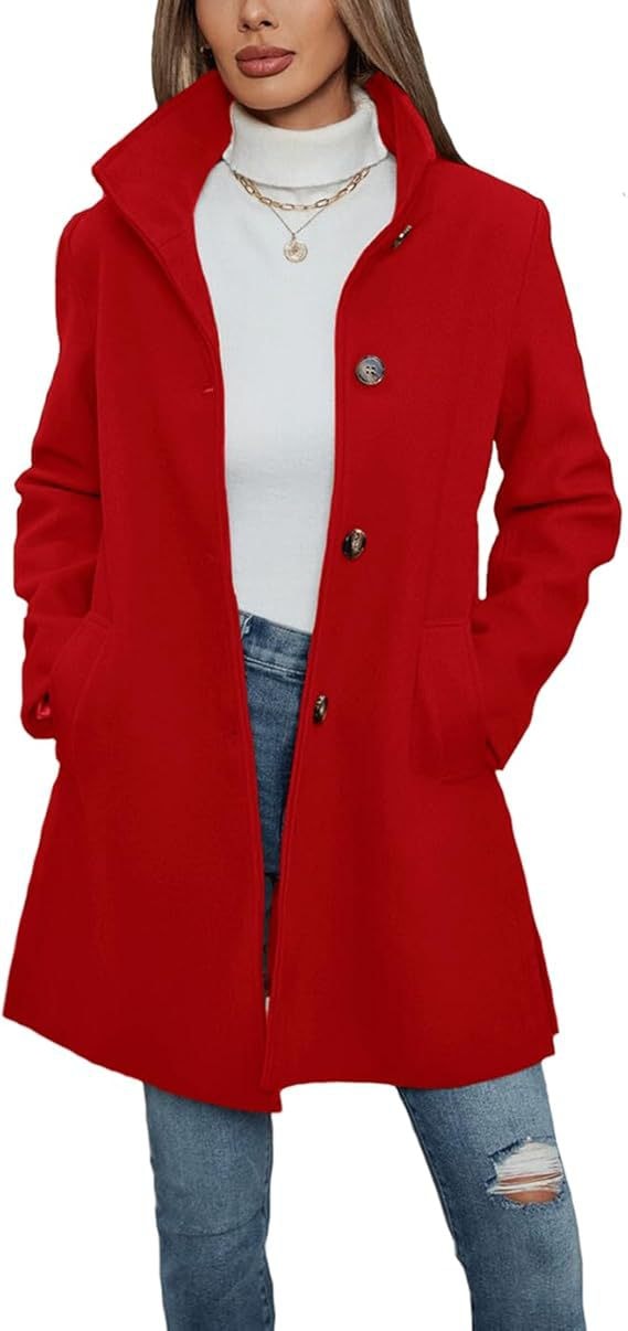 Close-up view of the red coat with a structured collar, button-front closure, and side pockets.