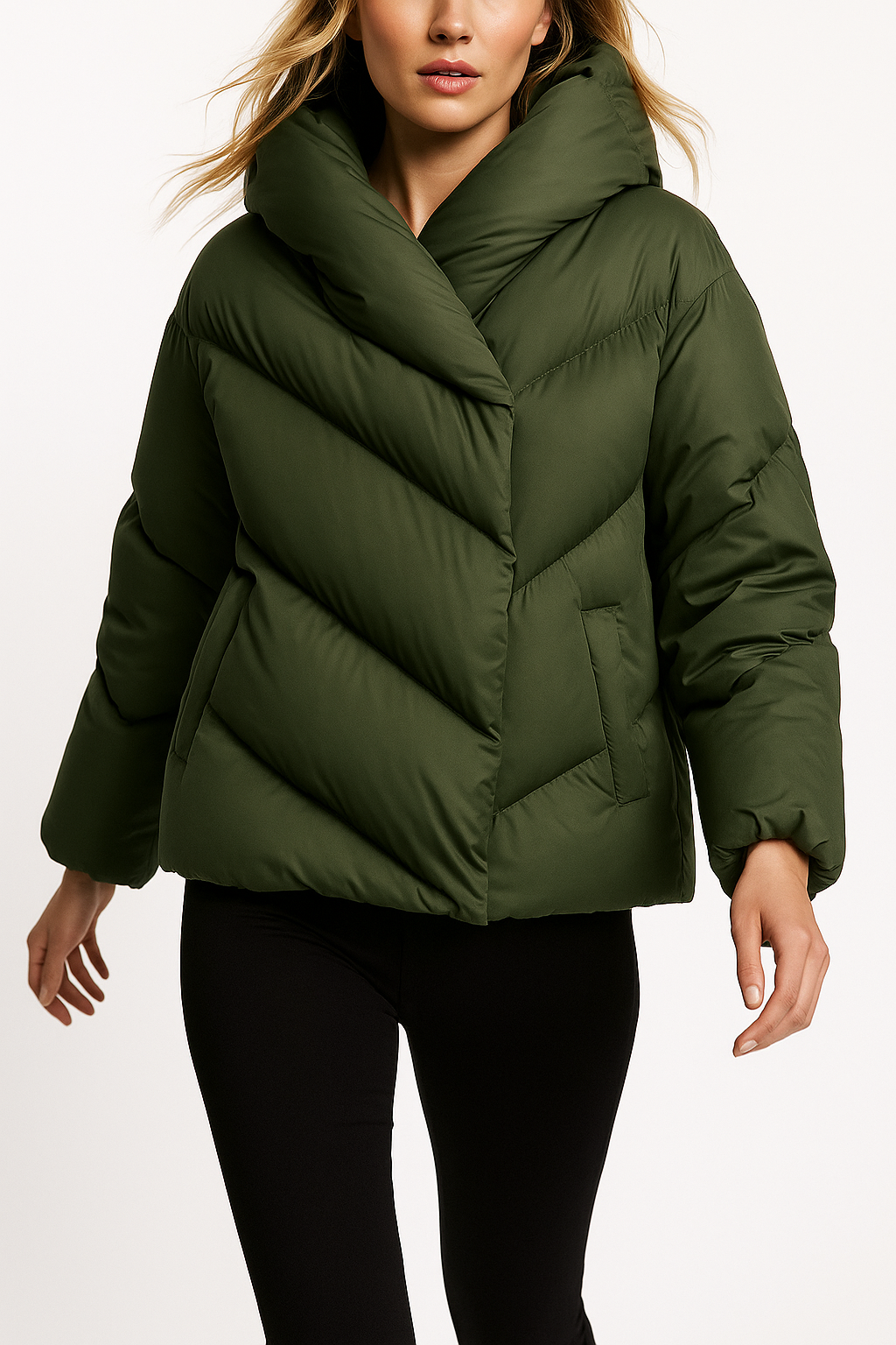 Woman wearing a hooded quilted puffer jacket in a cropped relaxed fit, styled with a light sweater and trousers._9