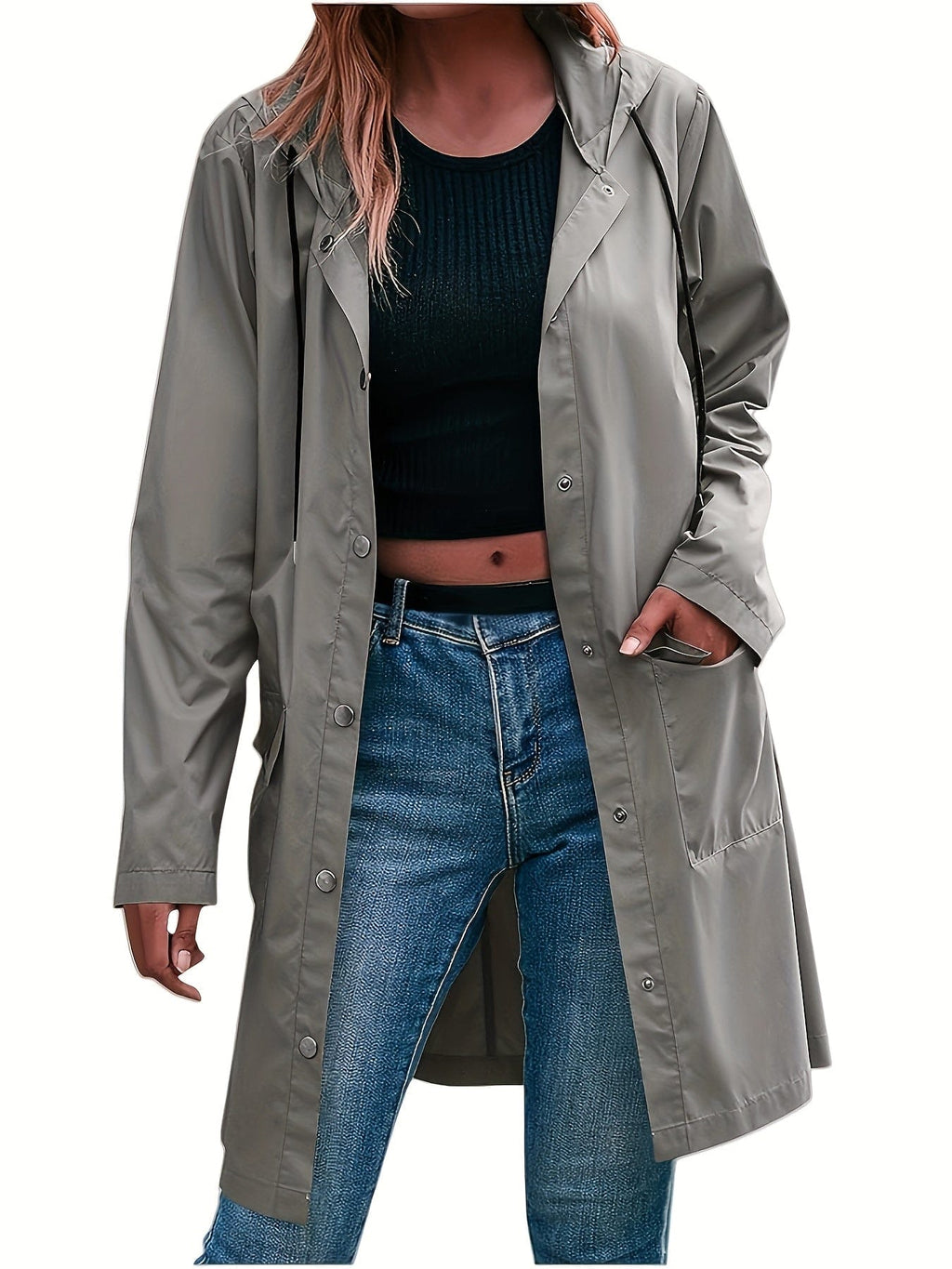 Model wearing a longline hooded trench coat with button-front closure over a black top and jeans._3