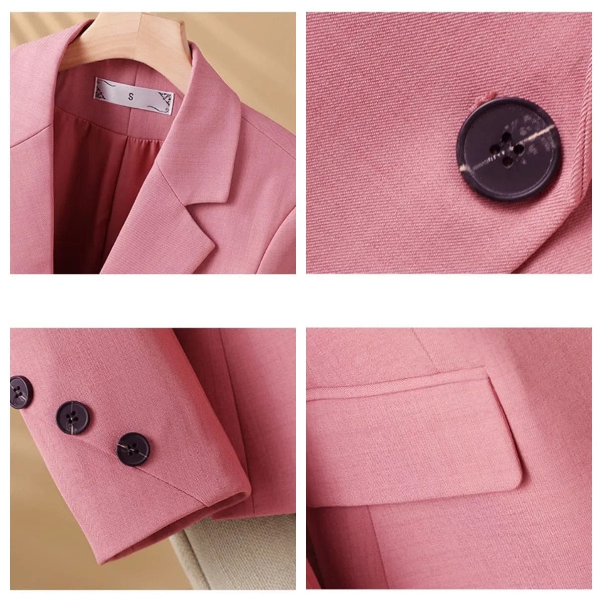 A tailored blazer with notched lapels, a two button front, flap pockets, and decorative cuff buttons displayed on a hanger._4