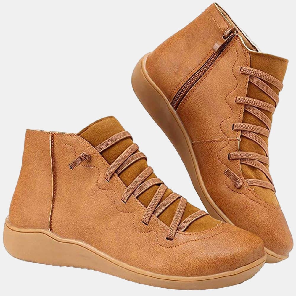 Pair of lace-up ankle boots with side zipper and cushioned sole in a casual everyday style._0