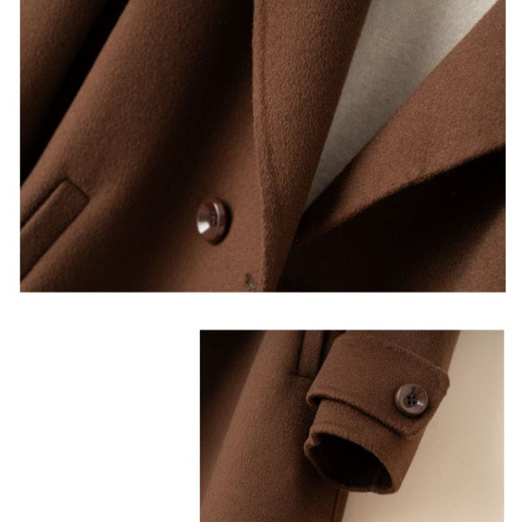 A tailored double breasted coat with notched lapels, front pockets, and buttoned cuff tabs displayed on a mannequin._7