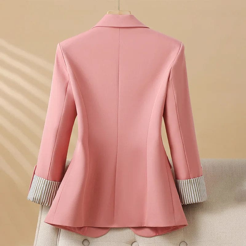 Front view of a single button blazer with notched lapels, flap pockets, and turned-up striped cuffs._1