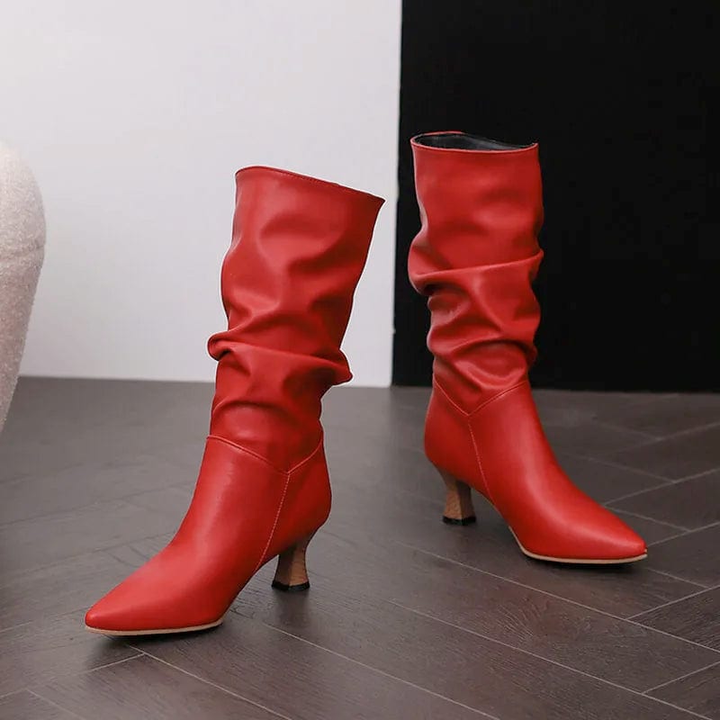 Woman wearing red mid-calf slouch boots with pointed toe and sculpted heel._3