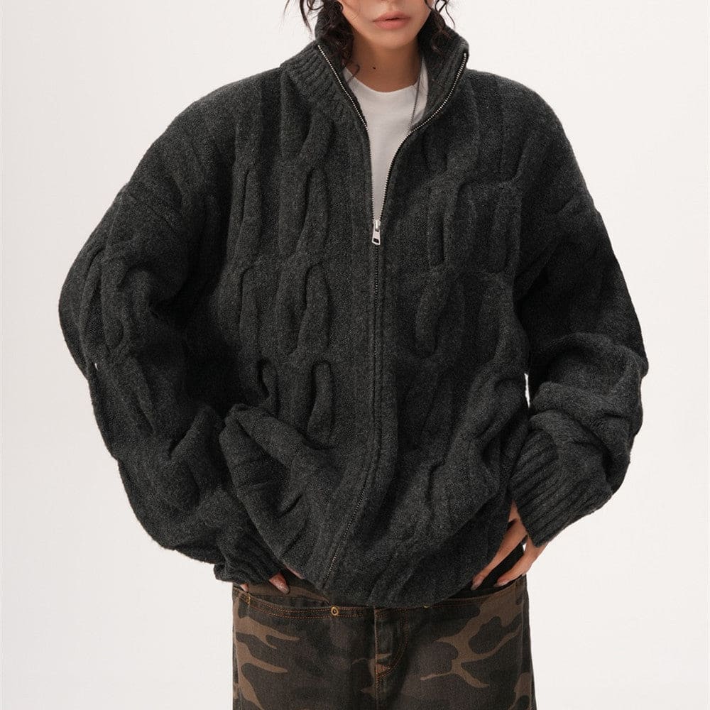 A model wears a textured zip front jacket with a high stand collar and relaxed silhouette._0