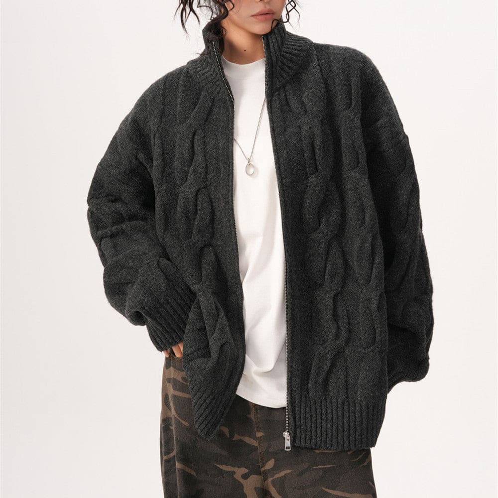 A model wears a textured zip front jacket with a high stand collar and relaxed silhouette._1