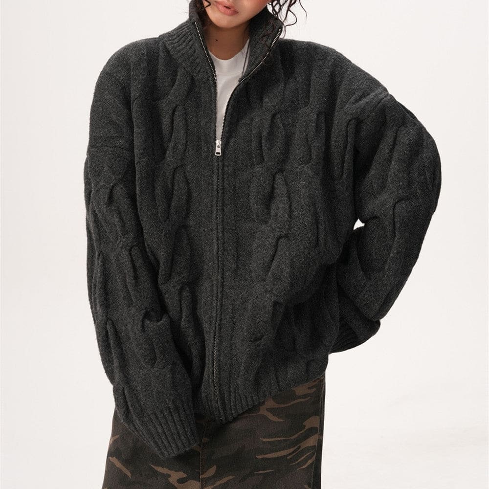 A model wears a textured zip front jacket with a high stand collar and relaxed silhouette._2