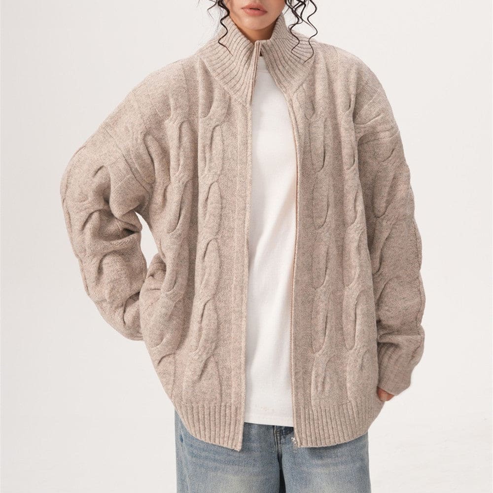 A model wears a textured zip front jacket with a high stand collar and relaxed silhouette._5