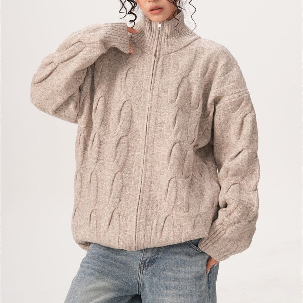 A model wears a textured zip front jacket with a high stand collar and relaxed silhouette._7