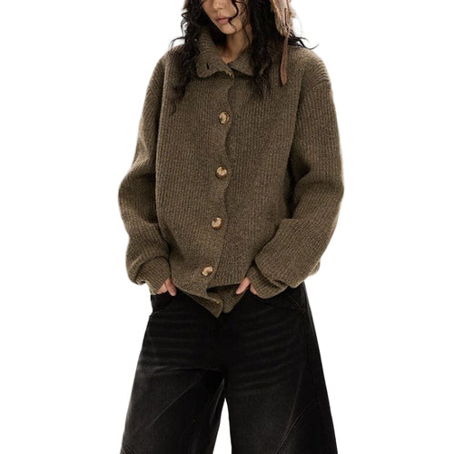 A model wears a collared button front cardigan with dropped shoulders and long sleeves._0