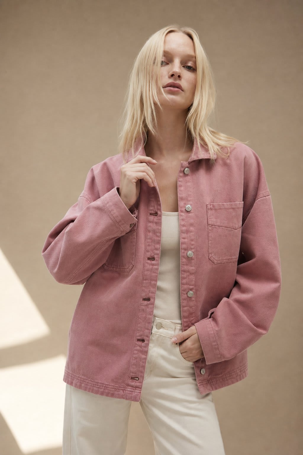 Amelia | oversized washed denim jacket with button-front closure and side-split hem