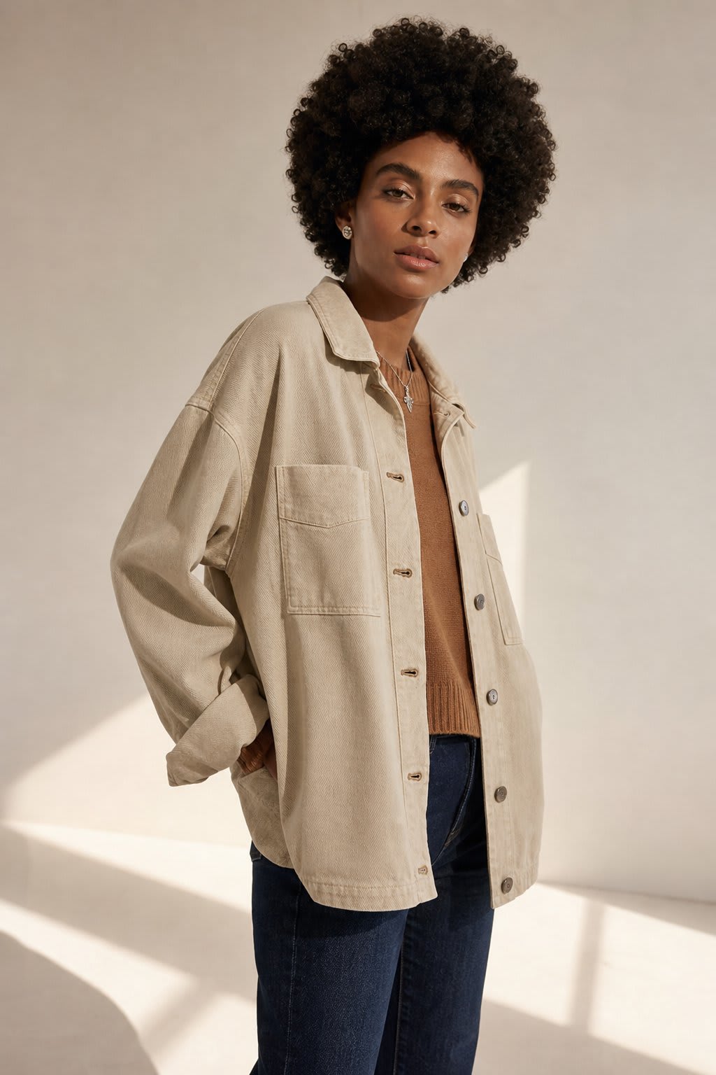 Amelia | oversized washed denim jacket with button-front closure and side-split hem