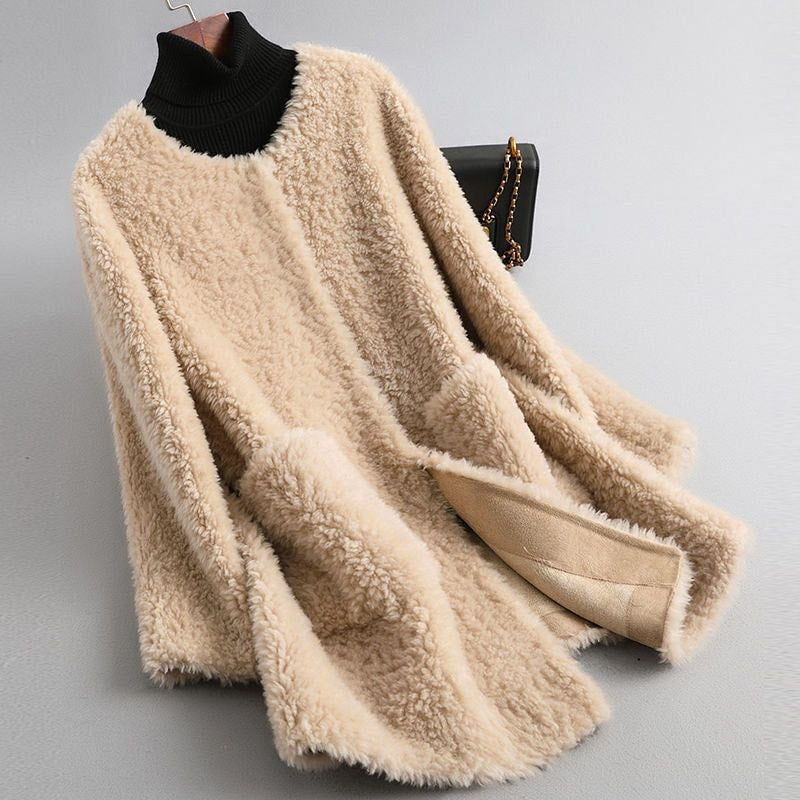 Cream plush open-front longline coat draped on a hanger, with wide front edges and a visible light lining.