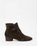 A side view of a pointed toe ankle boot with a decorative strap detail and low block heel._0