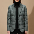 Woman wearing a quilted puffer blazer with notched collar and double-breasted front, styled over a black turtleneck._0