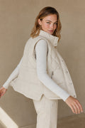 Deborah | quilted vest with stand collar and zip pockets