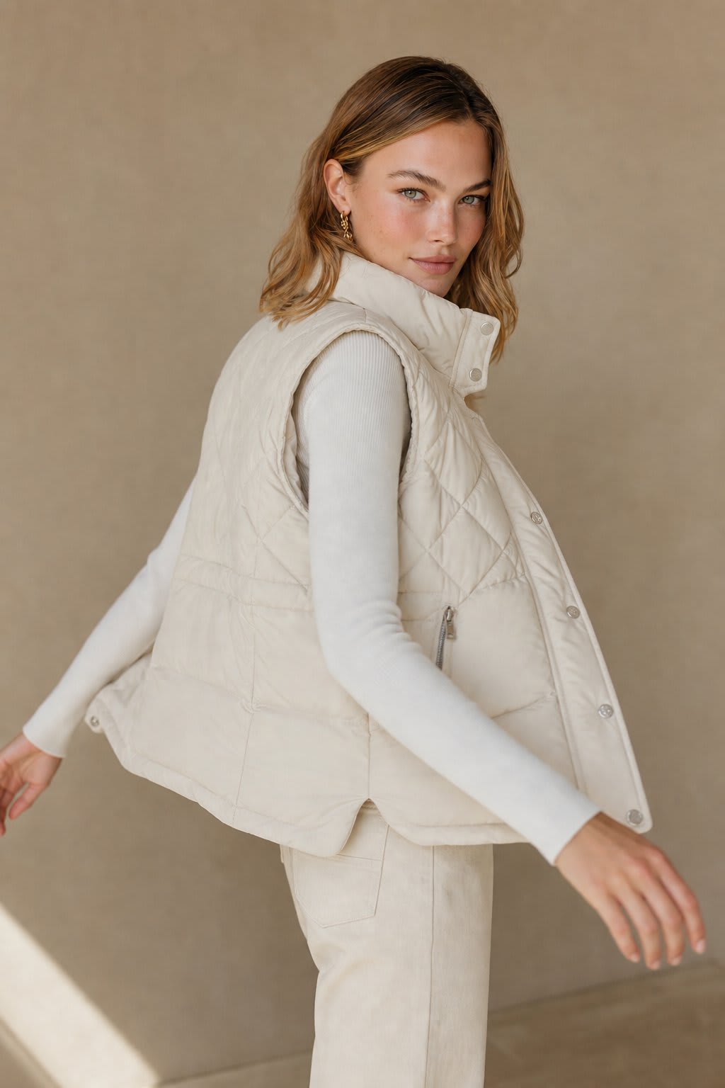 Deborah | quilted vest with stand collar and zip pockets