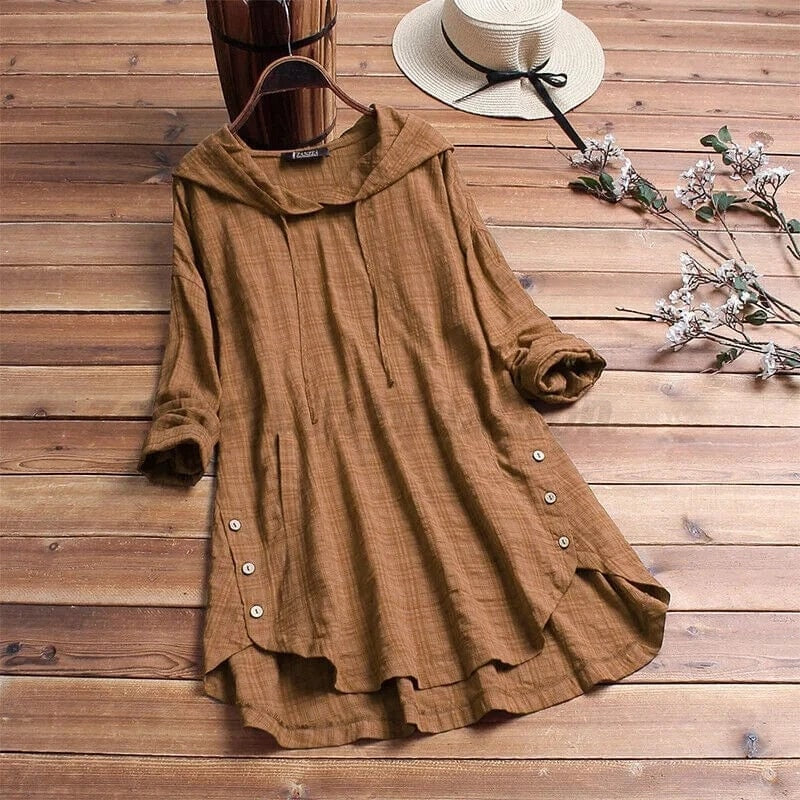 Brown longline tunic hoodie featuring a relaxed silhouette, draped hood, rolled long sleeves, side button accents, and a layered-looking hem.