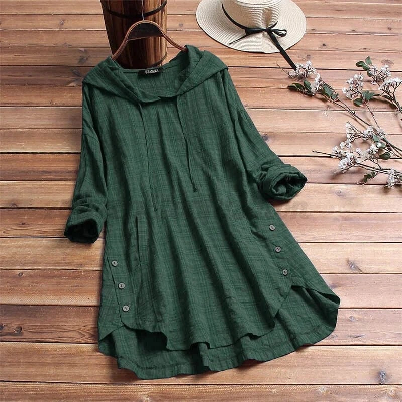 Deep green longline hoodie tunic displayed flat, showing its draped hood, relaxed sleeves, side buttons, and flared layered hem.
