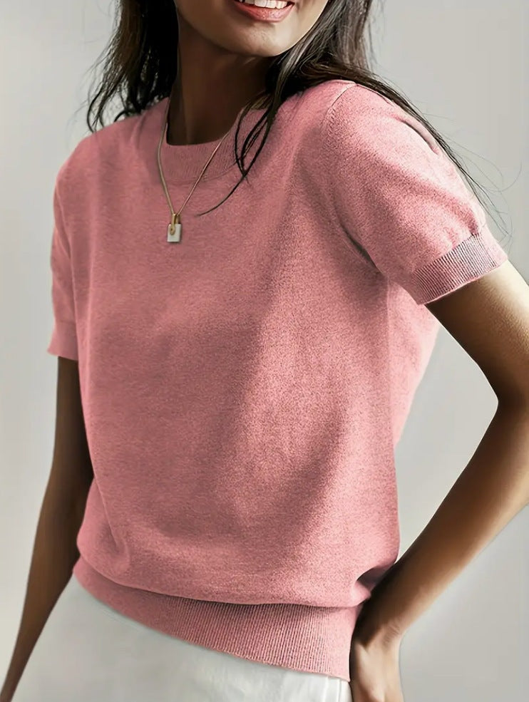 Pink short sleeve crew neck sweater with a neat ribbed hem and sleeve cuffs.