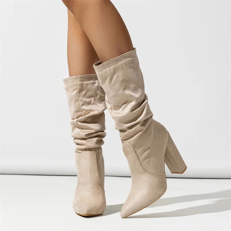 Knee-high boot with pleated slouchy shaft, pointed toe, and chunky block heel shown in profile view_11