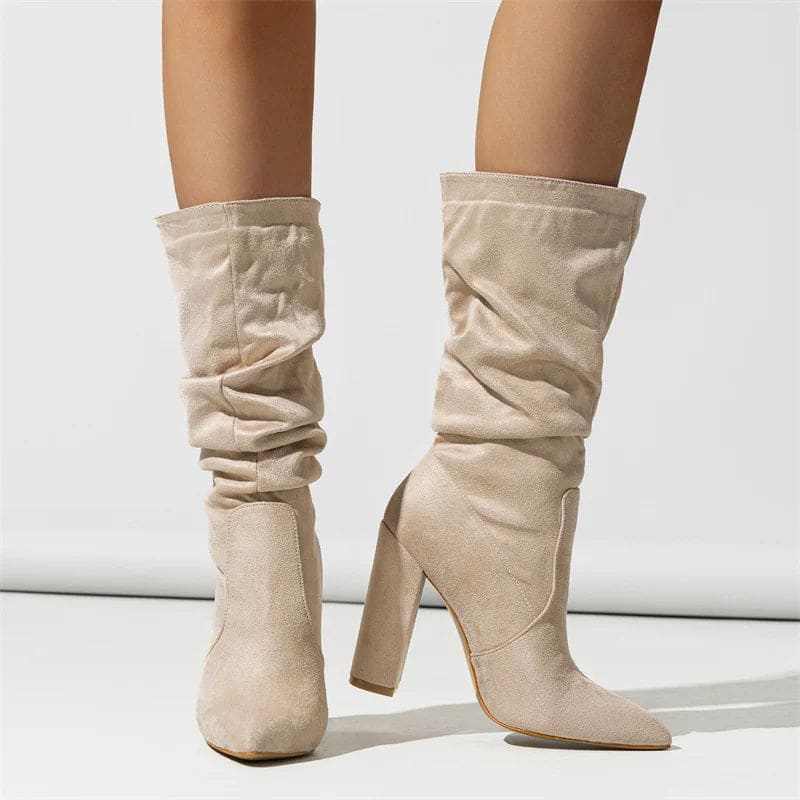 Knee-high boot with pleated slouchy shaft, pointed toe, and chunky block heel shown in profile view_12