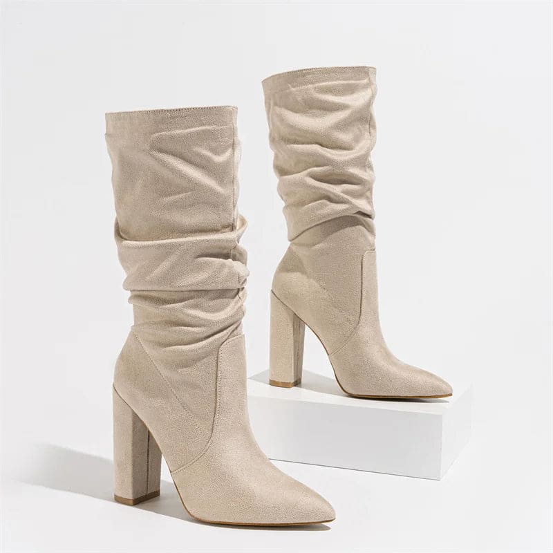 Knee-high boot with pleated slouchy shaft, pointed toe, and chunky block heel shown in profile view_13