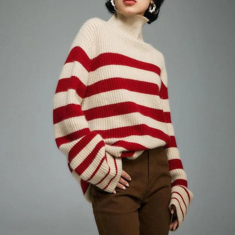A model wears a striped turtleneck sweater with long sleeves and a relaxed silhouette._2