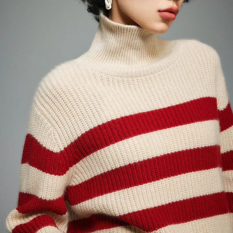 A model wears a striped turtleneck sweater with long sleeves and a relaxed silhouette._3