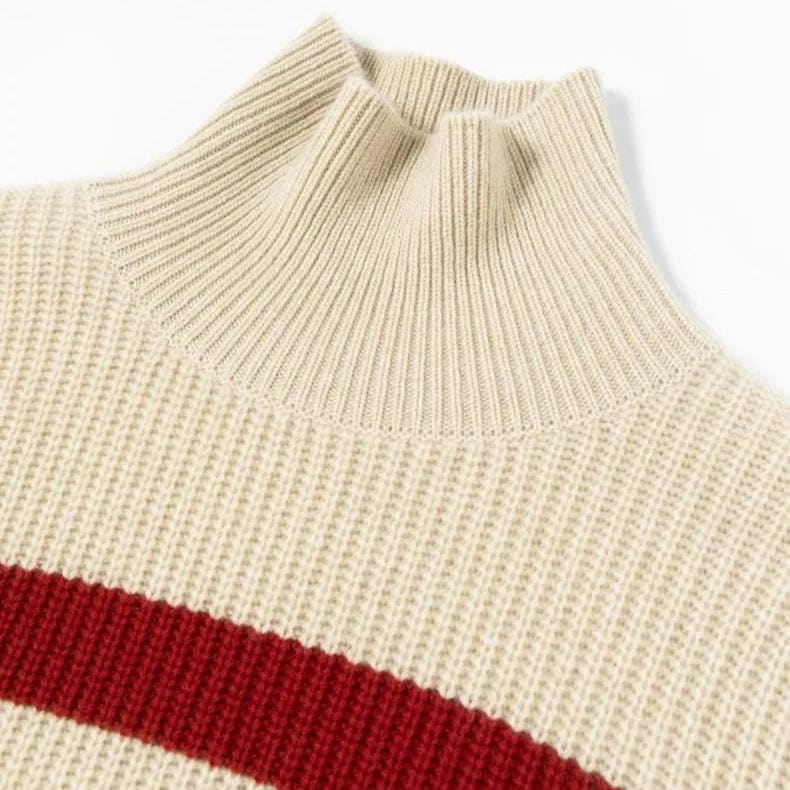 A model wears a striped turtleneck sweater with long sleeves and a relaxed silhouette._9