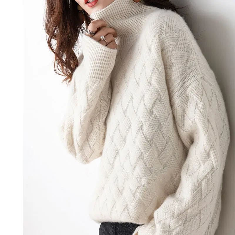 Woman wearing a beige oversized turtleneck sweater with cable knit texture and relaxed sleeves_2