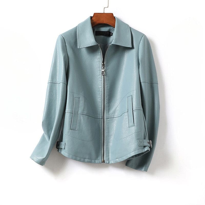 A long sleeve zip front jacket with a point collar, front patch pockets, and adjustable side tabs hangs against a white background._0